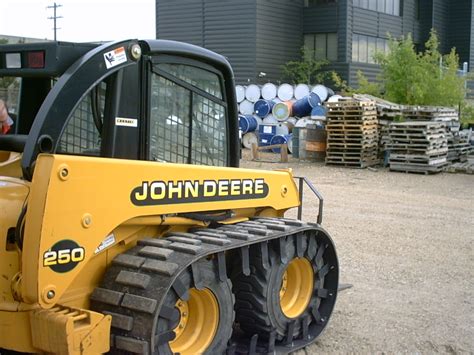 tracks for john deere skid steer|smallest skid steer with tracks.